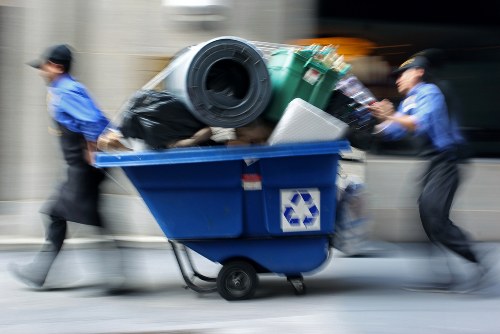 Crew finishing a safe and insured commercial waste collection